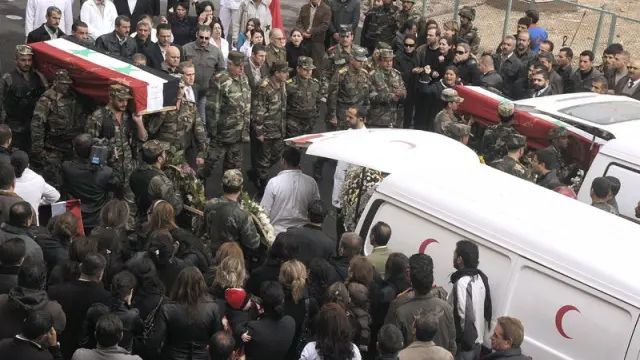 Funeral de policías en Damasco