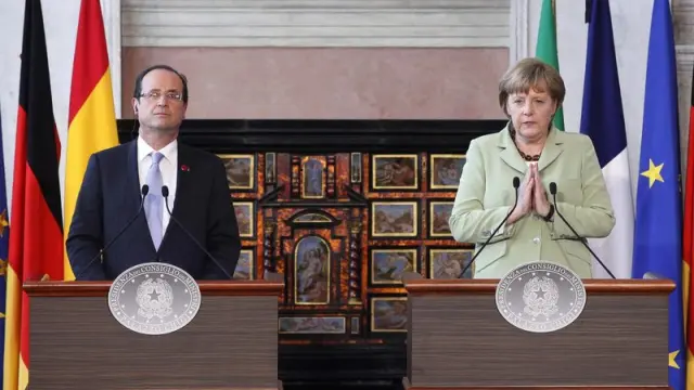 Merkel y Hollande durante el encuentro de líderes de la UE del pasado viernes.