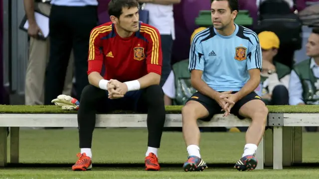 Xavi junto a Iker Casillas
