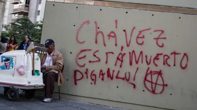 Un grafitti, en Caracas, especula con la muerte del presidente.