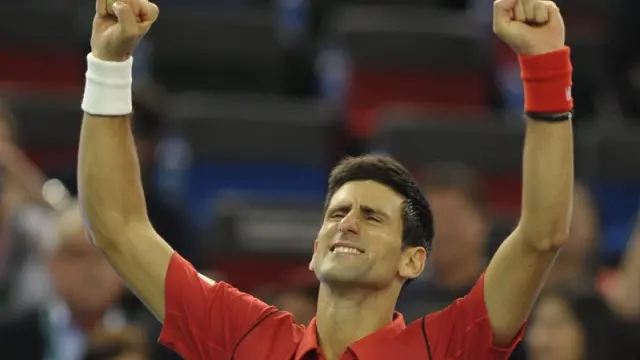 Djokovic celebra su victoria ante Tsonga