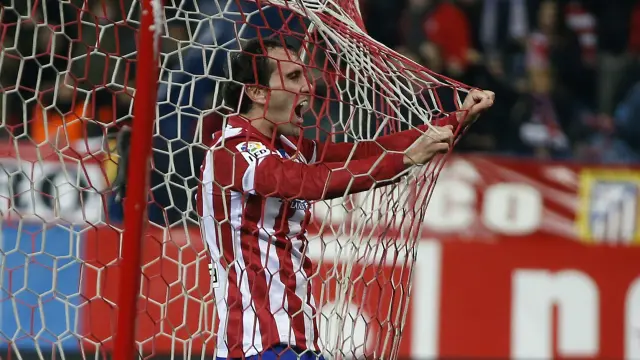 Diego Godín celebra el gol