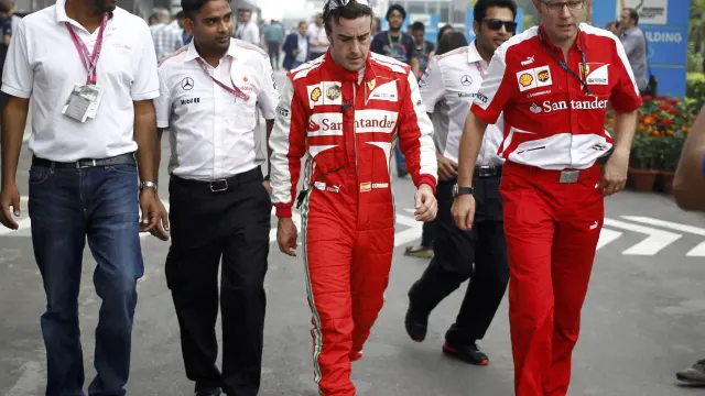 Fernando Alonso junto a Domenicali en el GP de la India