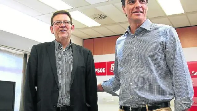 Pedro Sánchez, en julio junto al secretario general del PSOE valenciano, Ximo Puig.