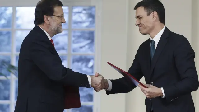 Rajoy y Sánchez una vez firmado el acuerdo