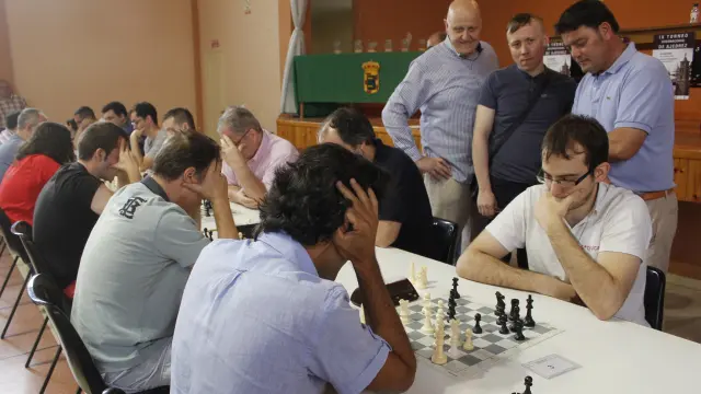 García, Ponomariov y Amador durante el desarrollo del torneo de ajedrez.