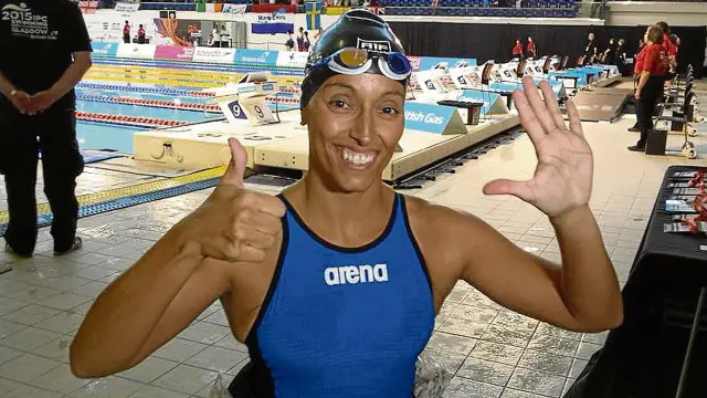 Teresa Perales, radiante tras haber logrado ayer el oro en 100 metros libre que suponía su sexto metal mundialista.