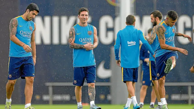 Luis Suárez, Leo Messi y Neymar que no ha viajado a Bilbao, en el entrenamiento de ayer.