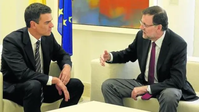 Sánchez y Rajoy durante una reunión que mantuvieron en julio de 2014 en el Palacio de la Moncloa.