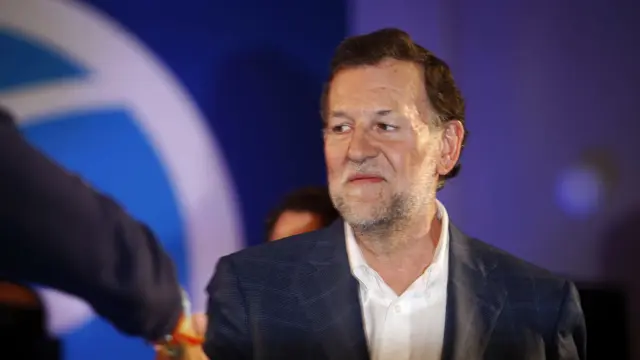 El presidente del Gobierno y candidato a la reelección por el PP, Mariano Rajoy, al inicio del mitin central de su partido hoy en A Coruña.