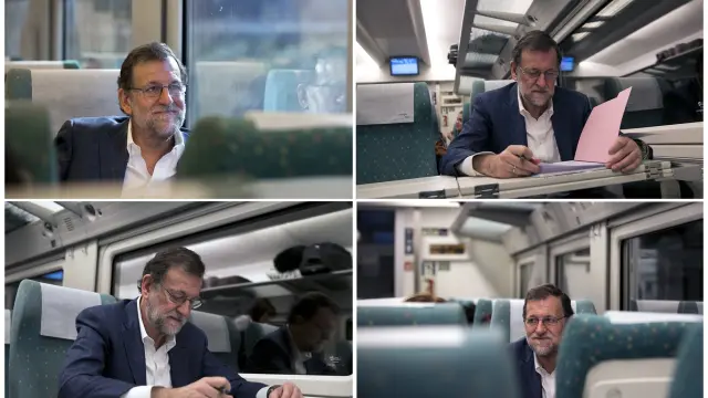 otografías facilitadas por el PP del presidente del Partido Popular y presidente en funciones del Gobierno, Mariano Rajoy, tomando notas en el tren en el que viaja hacia Zamora