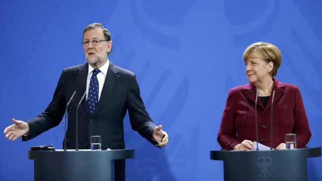 Mariano Rajoy y Angela Merkel en la cumbre de Berlín