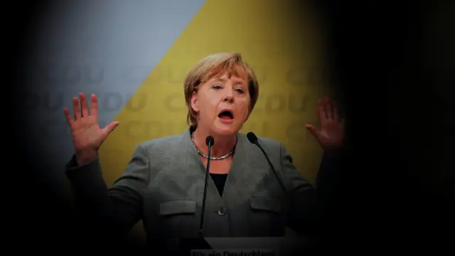 Merkel da un tirón de orejas al sector del motor alemán