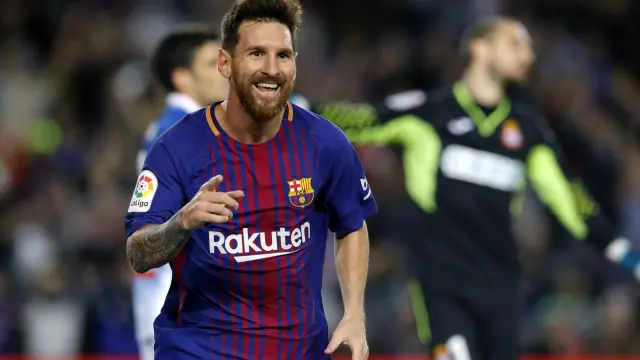 Messi celebra unos de los goles que marcó al Espanyol.