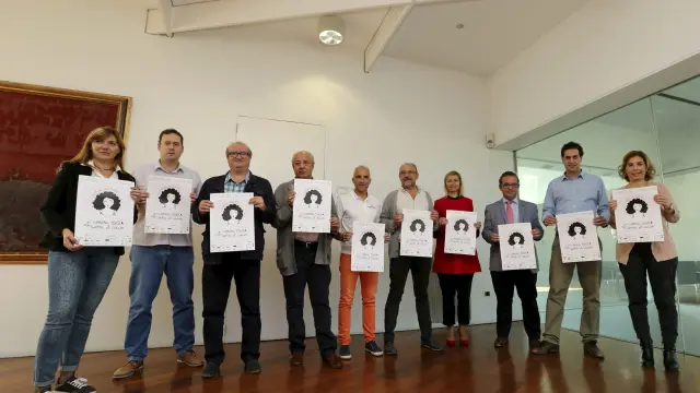 Organizadores y patrocinadores de la IV Carrera contra el Cáncer de Huesca