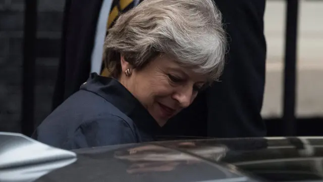 Theresa May, antes de partir a la reunión en Bruselas.