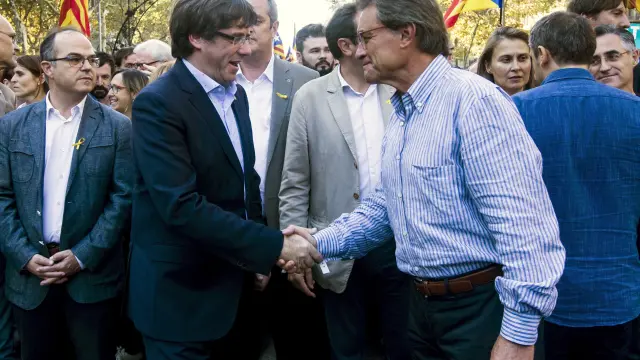 Carles Puigdemont y Artur Mas este sábado en Barcelona.