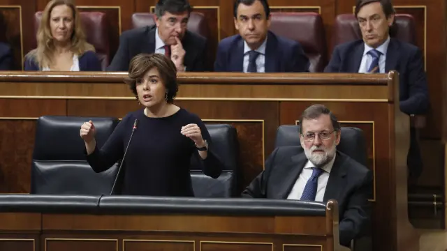 Sáenz de Santamaría y Rajoy en el Congreso.