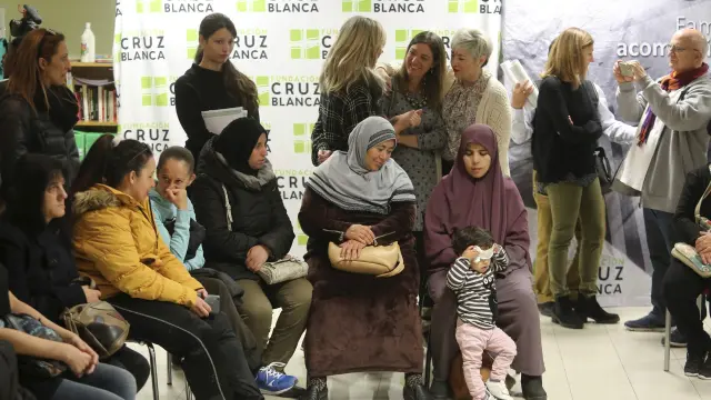 Asamblea informativa organizada por Cruz Blanca en Huesca para explicar la situación.