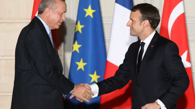 El presidente turco, Erdogan, junto a su homólogo francés, Emmanuel Macron.