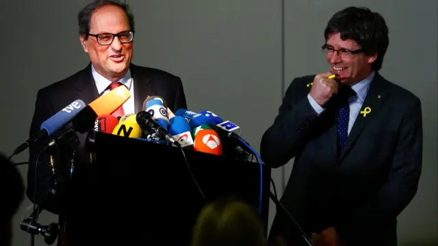 Carles Puigdemont y Quim Torra compareciendo ante los medios en Berlín.
