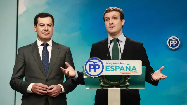 El líder del PP, Pablo Casado, junto al candidato del PP a la Junta, Juanma Moreno.