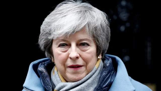 FILE PHOTO: British Prime Minister Theresa May walks outside Downing Street, as she faces a vote on Brexit, in London, Britain March 13, 2019. REUTERS/Henry Nicholls/File Photo [[[REUTERS VOCENTO]]] BRITAIN-EU/