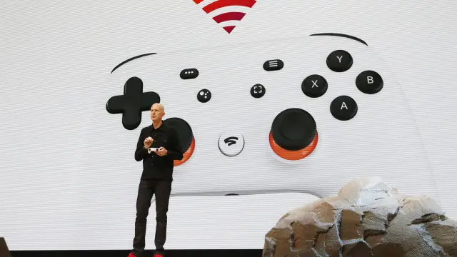 Google vice president and general manager Phil Harrison speaks during a Google keynote address announcing a new video gaming streaming service named Stadia that attempts to capitalize on the company's cloud technology and global network of data centers, at the Gaming Developers Conference in San Francisco, California, U.S., March 19, 2019. REUTERS/Stephen Lam [[[REUTERS VOCENTO]]] ALPHABET-GOOGLE/GAMING