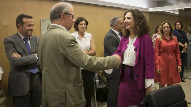 La ministra de Hacienda en funciones, María Jesús Montero, con el consejero de Hacienda, Fernando Gimeno, en un Consejo de Política Fiscal y Financiera.