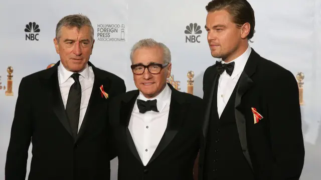 Oscar-winning director Martin Scorsese (C) stands with US actors Leondardo DiCaprio (R) and Robert De Niro (L), who presented Scorsese the Golden Globes Cecil B. DeMille Award for his "outstanding contribution to the entertainment field" during the 67th Golden Globe Awards on January 17, 2010 in Beverly Hills, California. The veteran film-maker, director of classic films including "Raging Bull," "Goodfellas" and "The Aviator," has already received two best director Globes during his career for "The Departed" and "Gangs of New York." AFP PHOTO / Valerie MACON US-GOLDEN GLOBES-SCORSESE