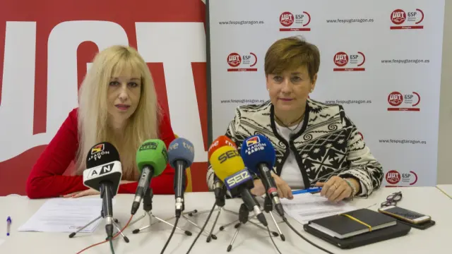 Angelica Marzo, de UGT, y Delia Lizana, de CC. OO. hoy en rueda de prensa en Zaragoza