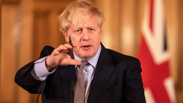 Britain's Prime Minister Boris Johnson speaks during a news conference on the ongoing situation with the coronavirus disease (COVID-19) in London