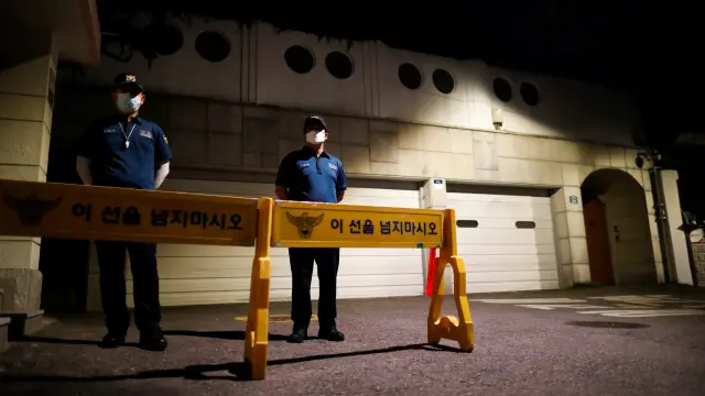 Rescue workers conduct a search operation for Seoul Mayor Park Won-soon in Seoul