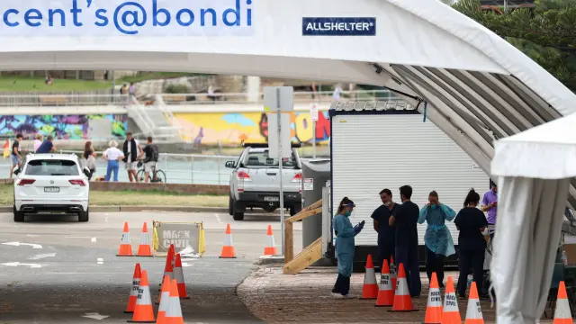 Medical workers are seen at a COVID-19 testing centre at Bondi Beach in Sydney