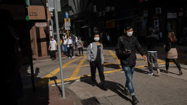 People wear masks in Hong Kong.
