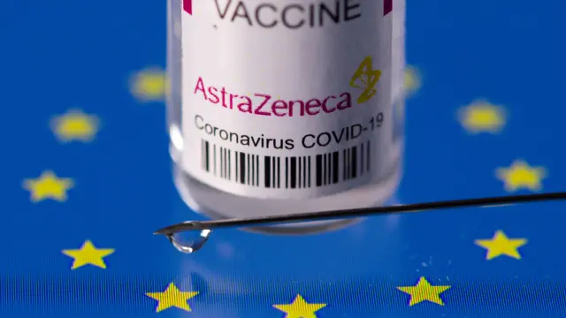 FILE PHOTO: Vial labelled "AstraZeneca coronavirus disease (COVID-19) vaccine" placed on displayed EU flag is seen in this illustration picture