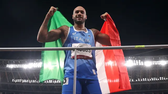 Tokyo 2020 Olympics - Athletics - Mens 100m - Final - OLS - Olympic Stadium, Tokyo, Japan - August 1, 2021. Lamont Marcell Jacobs of Italy celebrates after winning the gold medal REUTERS/Hannah Mckay[[[REUTERS VOCENTO]]] OLYMPICS-2020-ATH/M-100M-FNL