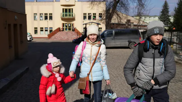Refugees fleeing Russia's invasion of Ukraine arrive in Poland