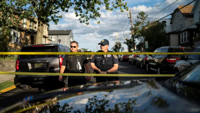 New Jersey Police officers stand guard near the building where alleged attacker of Salman Rushdie, Hadi Matar, lives in Fairview