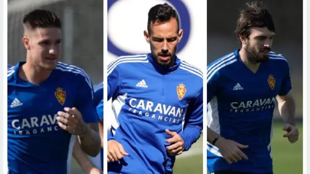 Vigaray, Molina y Eugeni, futbolistas del Real Zaragoza.