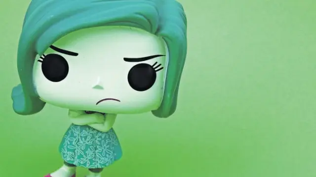Figurita caracterizada como el personaje Asco, que junto a Alegría, Ira, Tristeza y Miedo, protagoniza el filme ‘Del revés’, de Pixar.