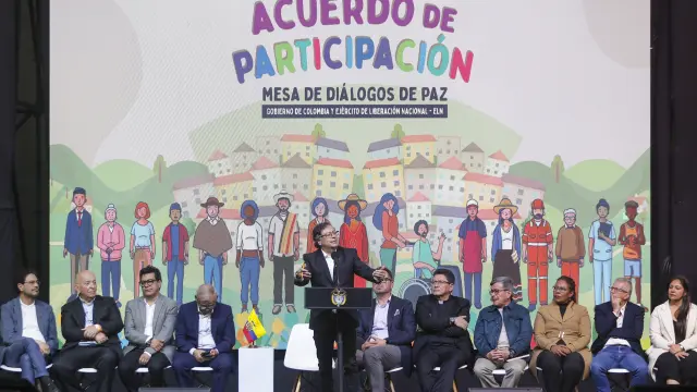 Colombia's President Gustavo Petro speaks during a ceremony to formally begin a six-month cease-fire as part of a process to forge a permanent peace between the National Liberation Army or ELN and the government, in Bogota, Colombia, Thursday, Aug. 3, 2023. (AP Photo/Ivan Valencia)