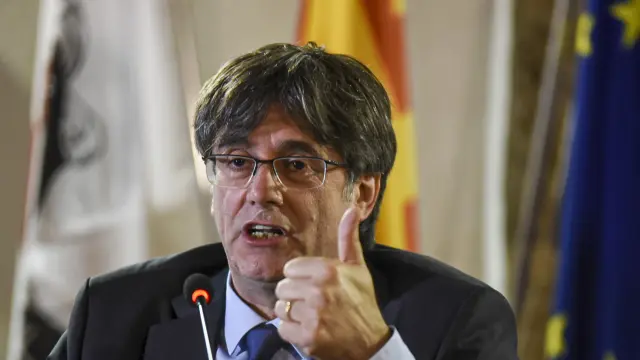 FILE - Catalan leader Carles Puigdemont speaks at a press conference in Alghero, Sardinia, on Oct. 4, 2021. Spain's Socialist Party has struck a deal with a fringe Catalan separatist party to grant an amnesty for potentially thousands of people involved in the region's failed secession bid in exchange for its key backing of acting Spanish Prime Minister Pedro Sánchez to form a new government. Socialist lawmaker and party official Santos Cerdán announced the deal on Thursday, Nov. 9, 2023, in Brussels. (AP Photo/Gloria Calvi, File)