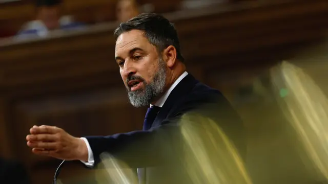 Spains far-right party Vox leader Santiago Abascal gestures as he speaks during the investiture debate as Spains Socialists seek to clinch a new term following a deal with the Catalan separatist Junts party for government support, a pact which involves amnesties for people involved with Catalonias failed 2017 independence bid, in Madrid, Spain November 15, 2023. REUTERS/Susana Vera [[[REUTERS VOCENTO]]]