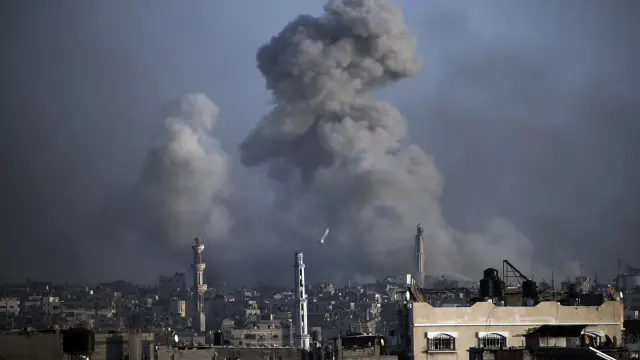 Smoke rises following Israeli bombardments in Khan Younis, southern Gaza Strip, Wednesday, Jan. 17, 2024. (AP Photo/Mohammed Dahman)