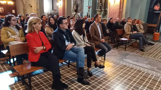 Autoridades de Huesca y del Principado de Andorra durante el acto de homenaje en la iglesia de San Martín.