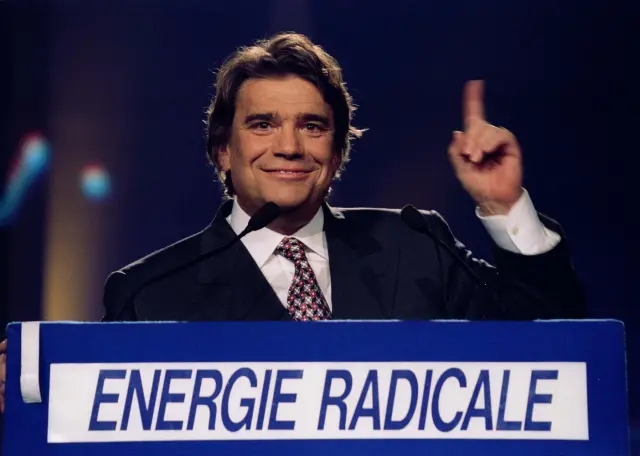 FILE PHOTO: French businesman and European election candidate Bernard Tapie delivers his speech at a campaign meeting