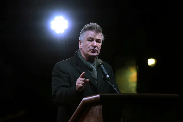 FILE PHOTO: Actor Alec Baldwin speaks at a protest against U.S. President-elect Donald Trump outside the Trump International Hotel in New York City