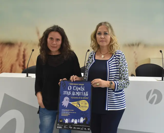 Idoya Álvarez, alcaldesa de Lupiñén, y Beatriz Calvo, consejera de Cultura y Deportes de la Comarca Hoya de Huesca, en la presentación de la marcha 'El camino de las almetas'.