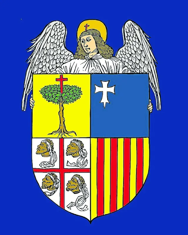 El emblema actual del Justicia data del siglo XV y es un ángel que protege a la Comunidad Autónoma, representada por su histórico escudo.